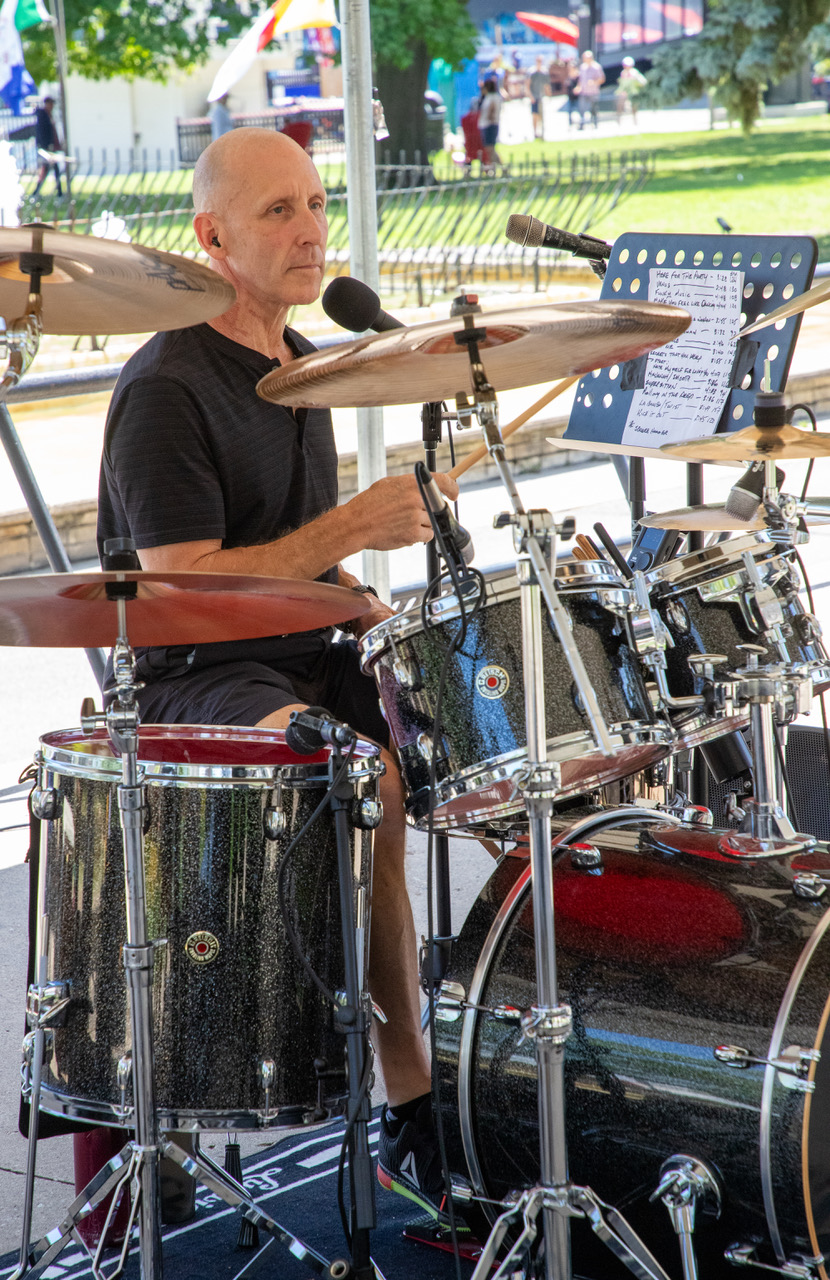 Greg from River Cats country rock band performing in Downtown Kingston