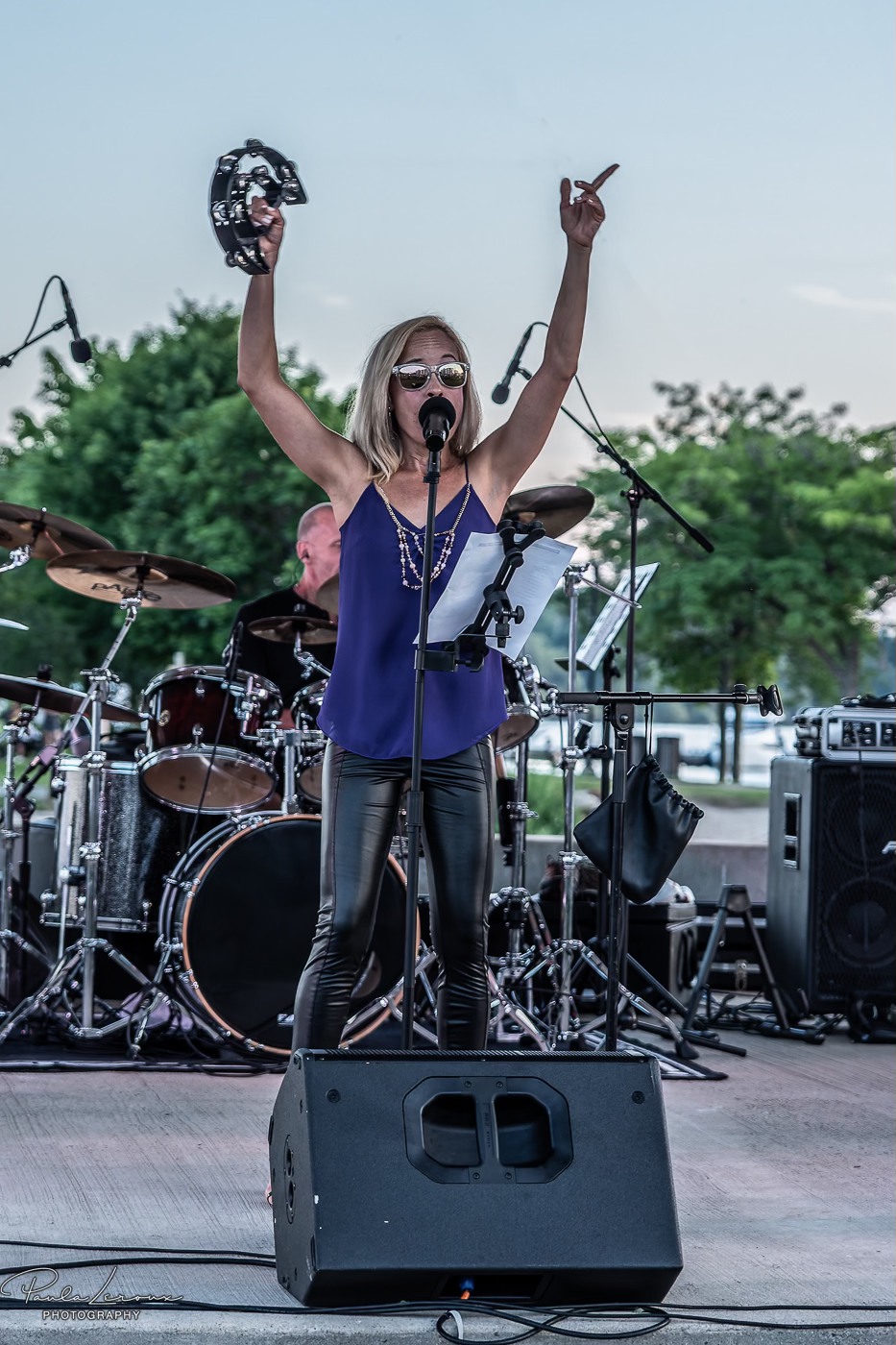 Kiri from River Cats band performing live at Kingston Music Series festival