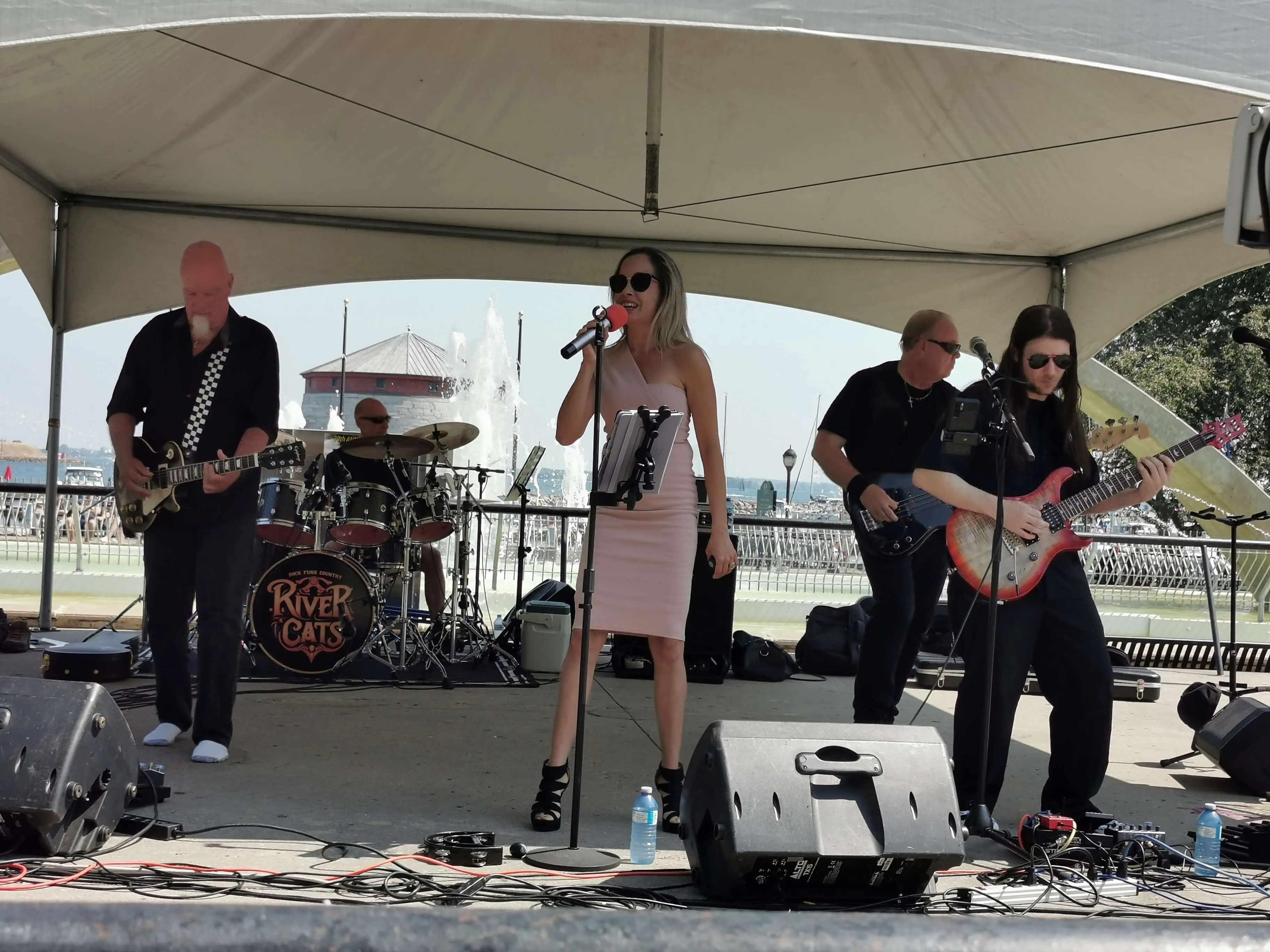 River Cats band performing live in Downtown Kingston 2025