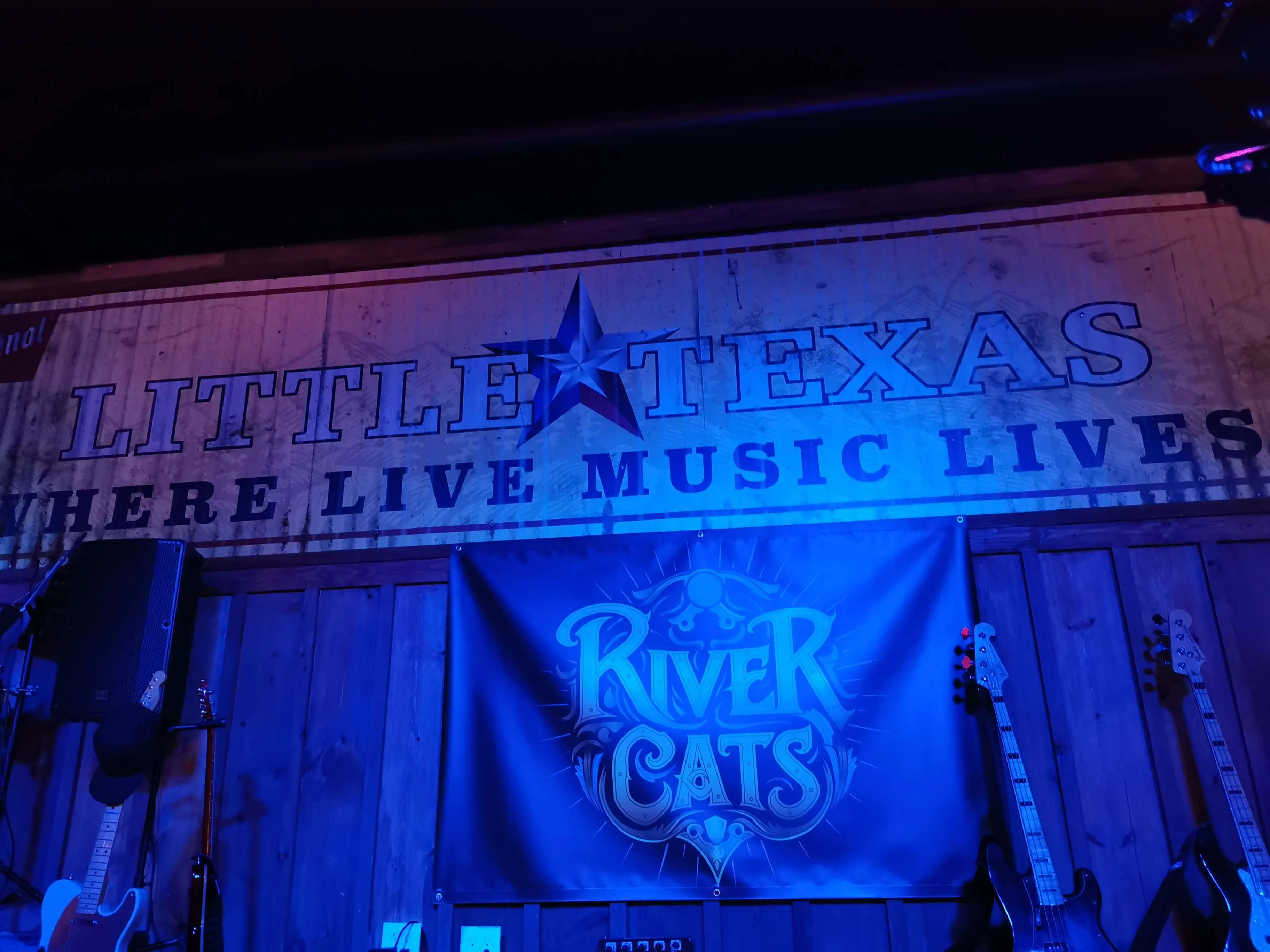 River Cats energetic live performance at Little Texas bar Belleville with dancing crowd and stage lights